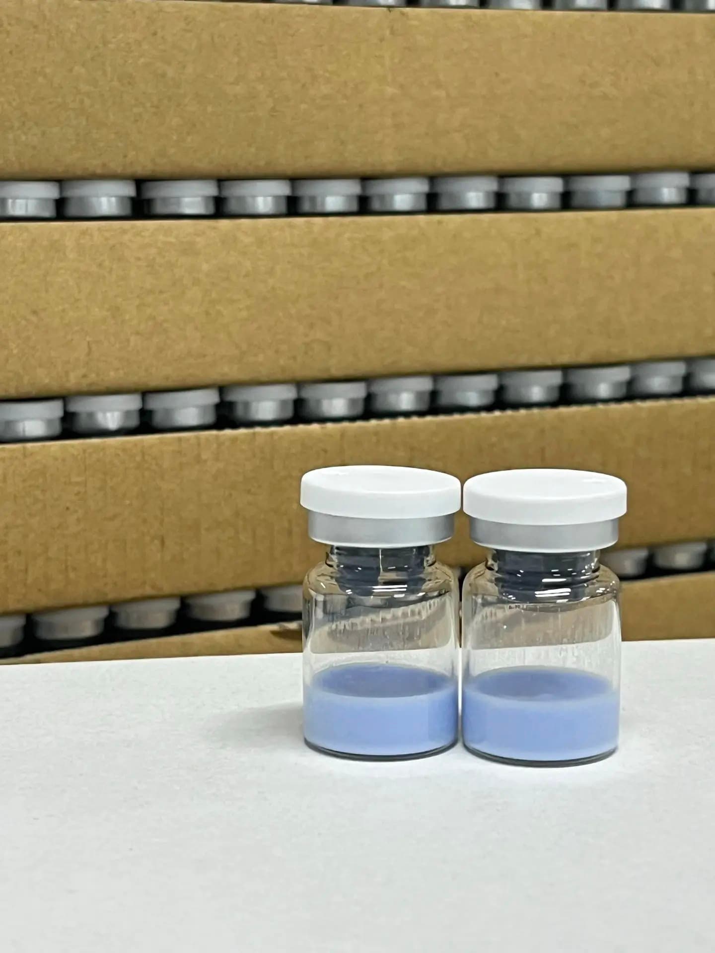 Freeze-dried skincare components shown in a batch production setting